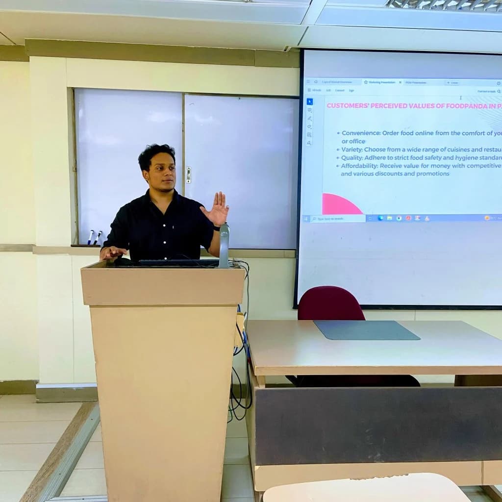 Muhammad Mashhood, Founder of Tutify, presenting at IBA Karachi